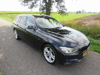 Vaurioauto  passenger cars BMW 3-serie Touring 1.6  136pk  Automaat  High Executive 2014  [ zeer luxe uitvoering top staat 2014/6