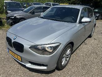 damaged passenger cars BMW 1-serie 116i   5 Drs 2012/4