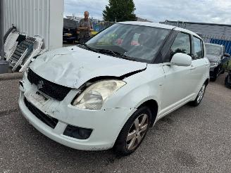 uszkodzony samochody osobowe Suzuki Swift 1.3 Shogun 2009/1