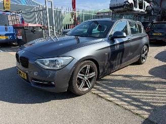 Damaged car BMW 1-serie 116D EDE HIGH EXECUTIVE 2014/1